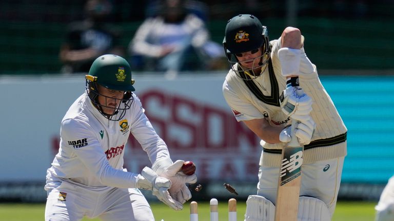 Smith, centre is bowled out by South Africa's Mulder