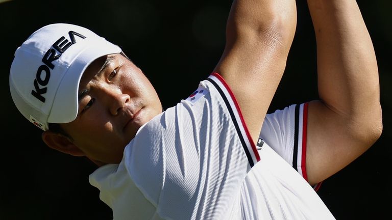 South Korea...s Kim Joo-hyung, better known as Tom Kim, plays a shot during the first round of golf at the Asian Games 