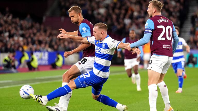 West Ham United's Tomas Soucek and Queens Park Rangers' Boy Kemper battle for the ball as Jarrod Bowen looks on 