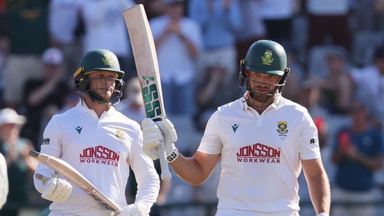 South Africa's Wiaan Mulder, right, celebrates his fifty with his teammate Ryan Rickelton, on day four of the third cricket test match between South Africa and Australia, in Cape Town, South Africa, Friday, Oct. 30, 2026. (AP Photo/Halden Krog)