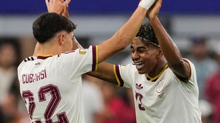 Spain's Pau Cubarsi (22) and Lamine Yamal (19) celebrate during the World Cup round of 16 soccer match between Portugal and Spain in Arlington, Texas, near Dallas, Monday, July 6, 2026. (AP Photo/Tony Gutierrez)